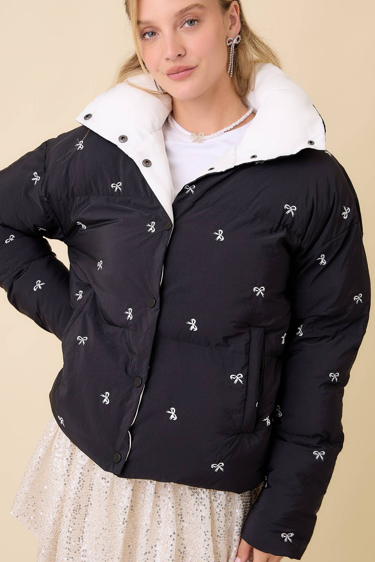 Black Ribbon Bow Embroidered Puffer Jacket | Main Strip