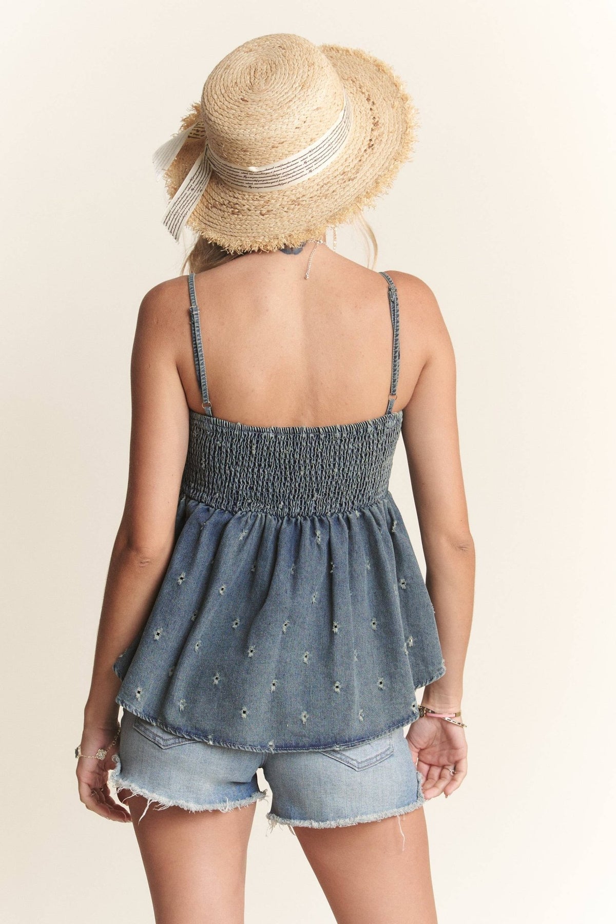 BOW ACCENT DISTRESSED WASHED DENIM CAMISOLE TOP WITH ADJUSTABLE STRAPS AND EYELET DETAIL | Madelyn