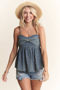 BOW ACCENT DISTRESSED WASHED DENIM CAMISOLE TOP WITH ADJUSTABLE STRAPS AND EYELET DETAIL | Madelyn