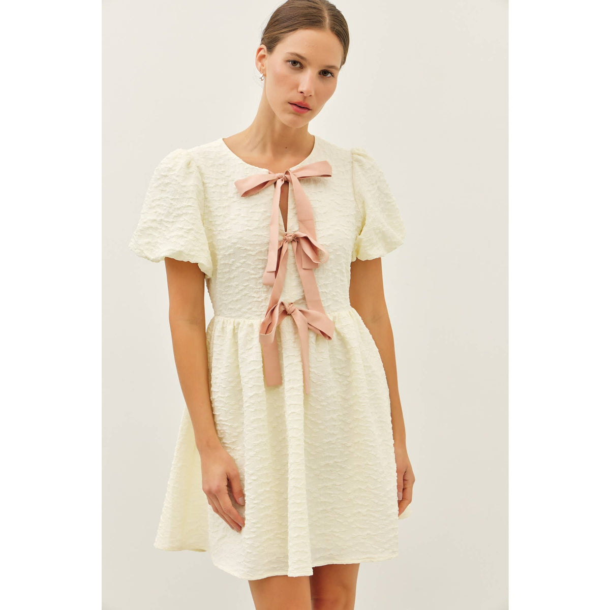 BUBBLE TEXTURED BOW TIE FRONT MINI DRESS | idem ditto