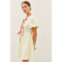 BUBBLE TEXTURED BOW TIE FRONT MINI DRESS | idem ditto