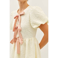 BUBBLE TEXTURED BOW TIE FRONT MINI DRESS | idem ditto