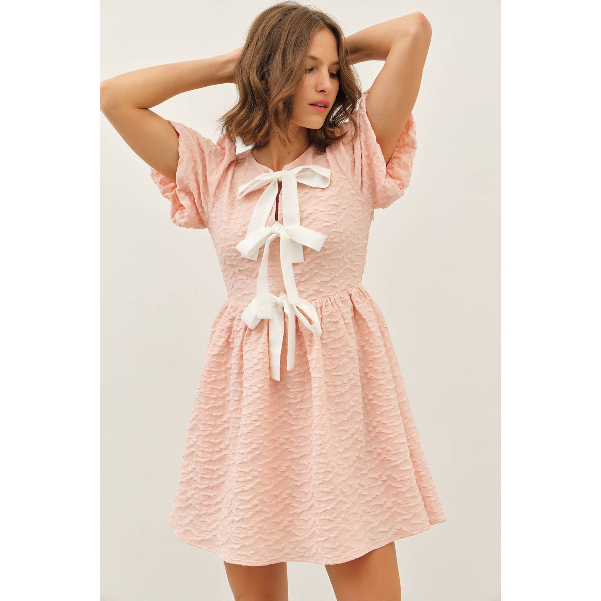BUBBLE TEXTURED BOW TIE FRONT MINI DRESS | idem ditto
