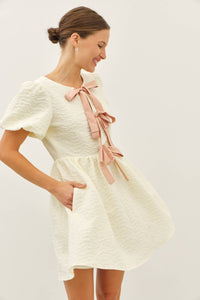 BUBBLE TEXTURED BOW TIE FRONT MINI DRESS | idem ditto