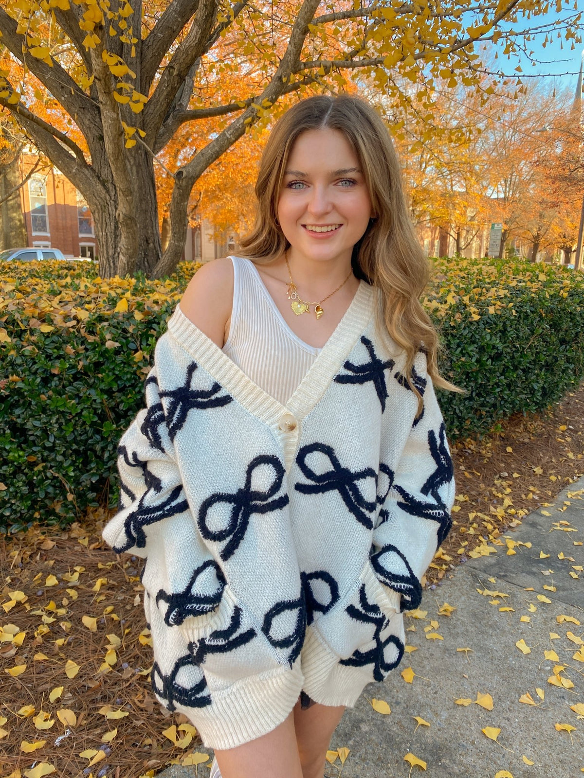 Oversized White Ribbon Pullover Sweater With Black Bows Cardigan | BUCKETLIST