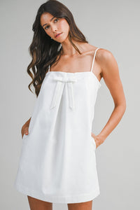WHITE BOW FRONT DRESS WITH ADJUSTABLE SHOULDER STRAPS | Mable