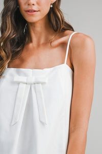 WHITE BOW FRONT DRESS WITH ADJUSTABLE SHOULDER STRAPS | Mable