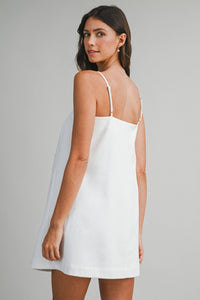WHITE BOW FRONT DRESS WITH ADJUSTABLE SHOULDER STRAPS | Mable