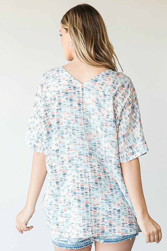 Blue Multi-Color Grid Pattern Short Sleeve Plus Top with High Low Hem and Front/Back V Neckline Sissy Boutique